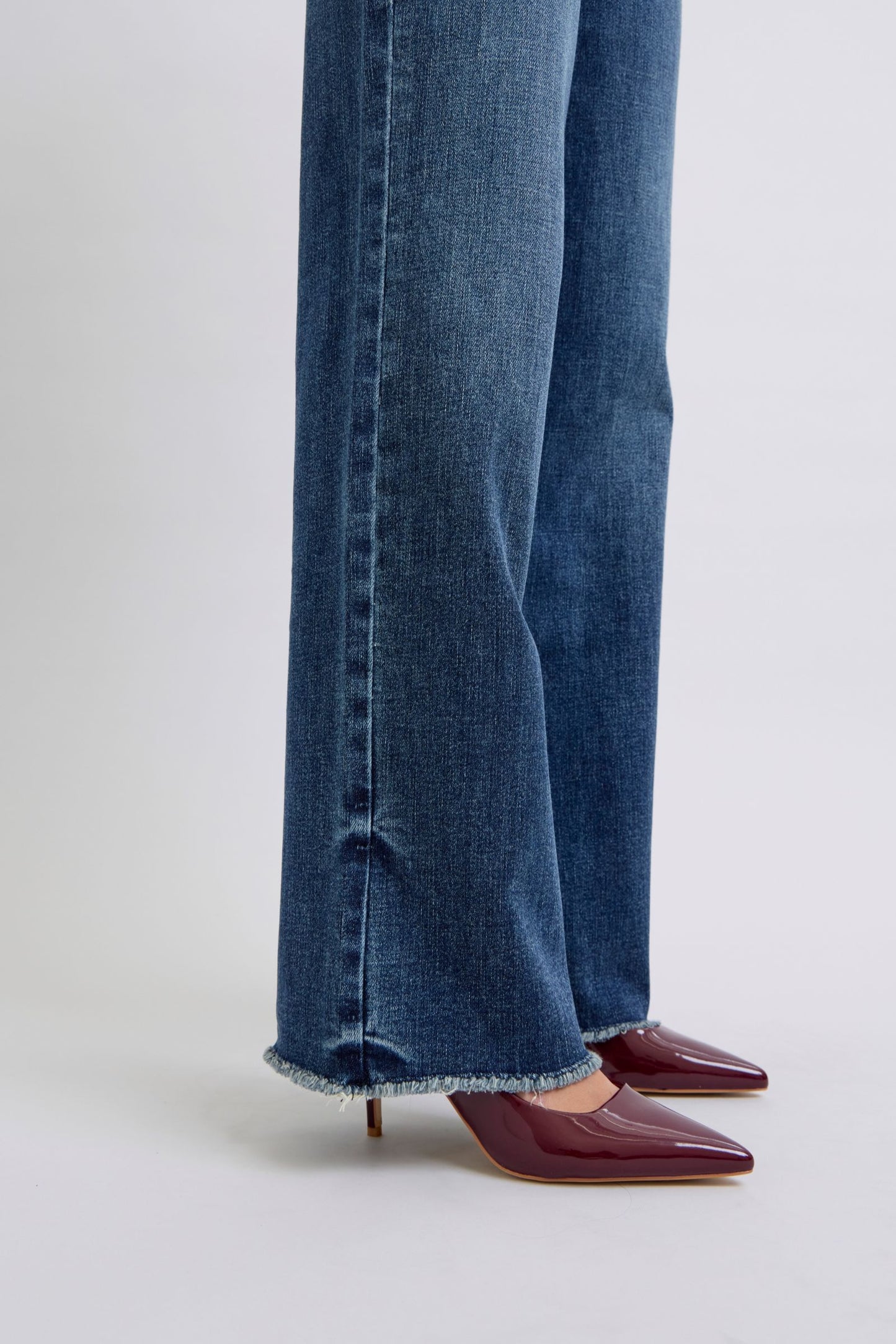 Rock your style with Judy Blue's Full Size Raw Hem Mid Rise Jeans! 🛍️✨ #FashionGoals #DenimLove