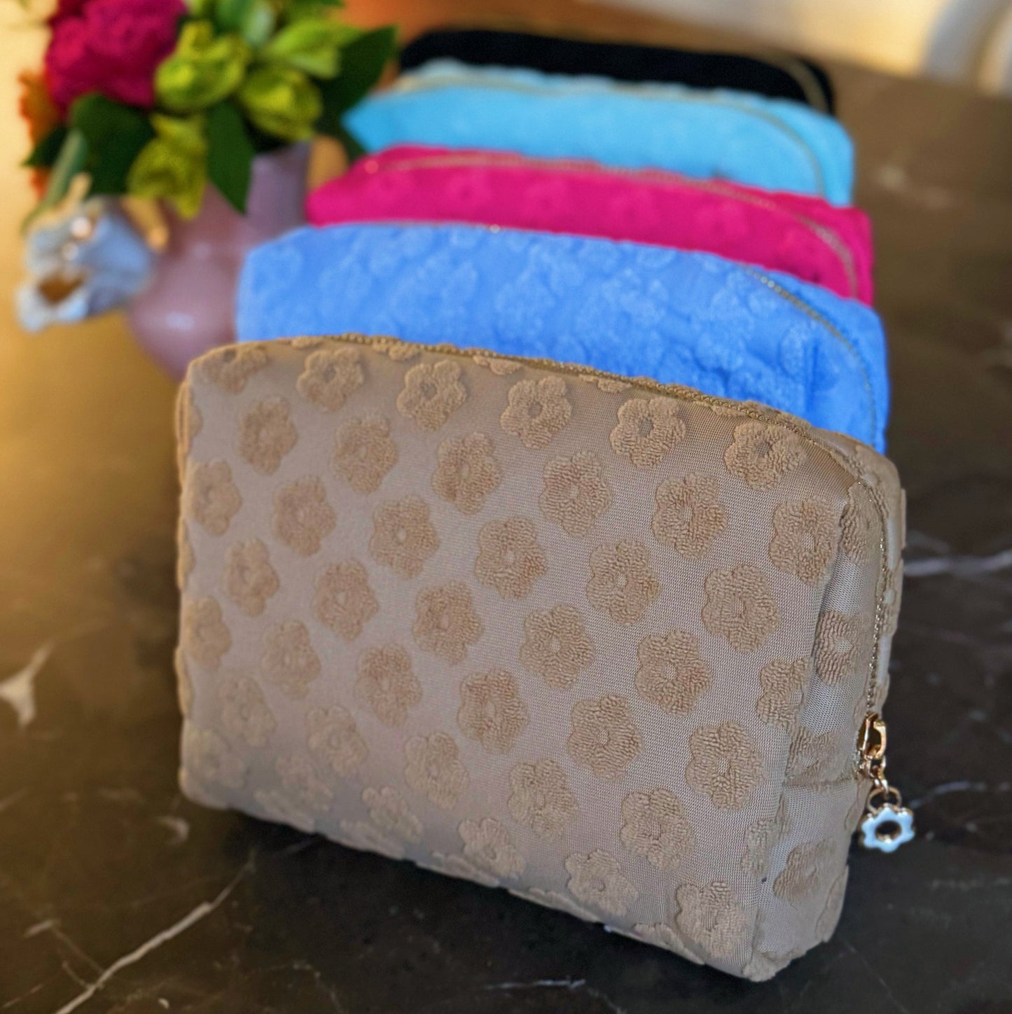 Get Glam with Our Embossed Daisy Blossom Cosmetic Case! 🌼✨