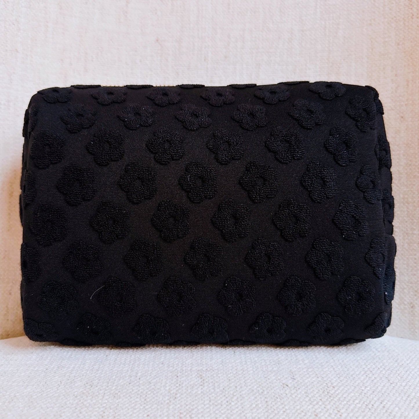 Get Glam with Our Embossed Daisy Blossom Cosmetic Case! 🌼✨