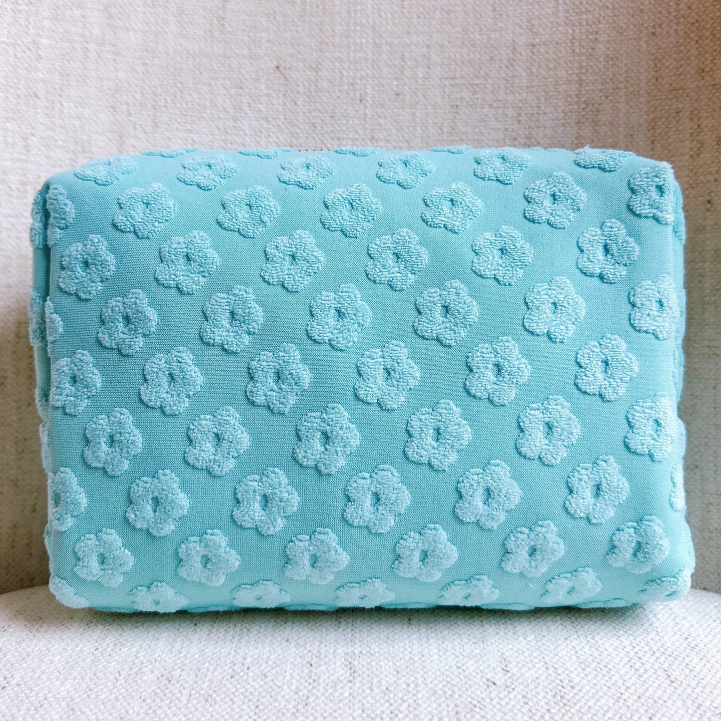 Get Glam with Our Embossed Daisy Blossom Cosmetic Case! 🌼✨