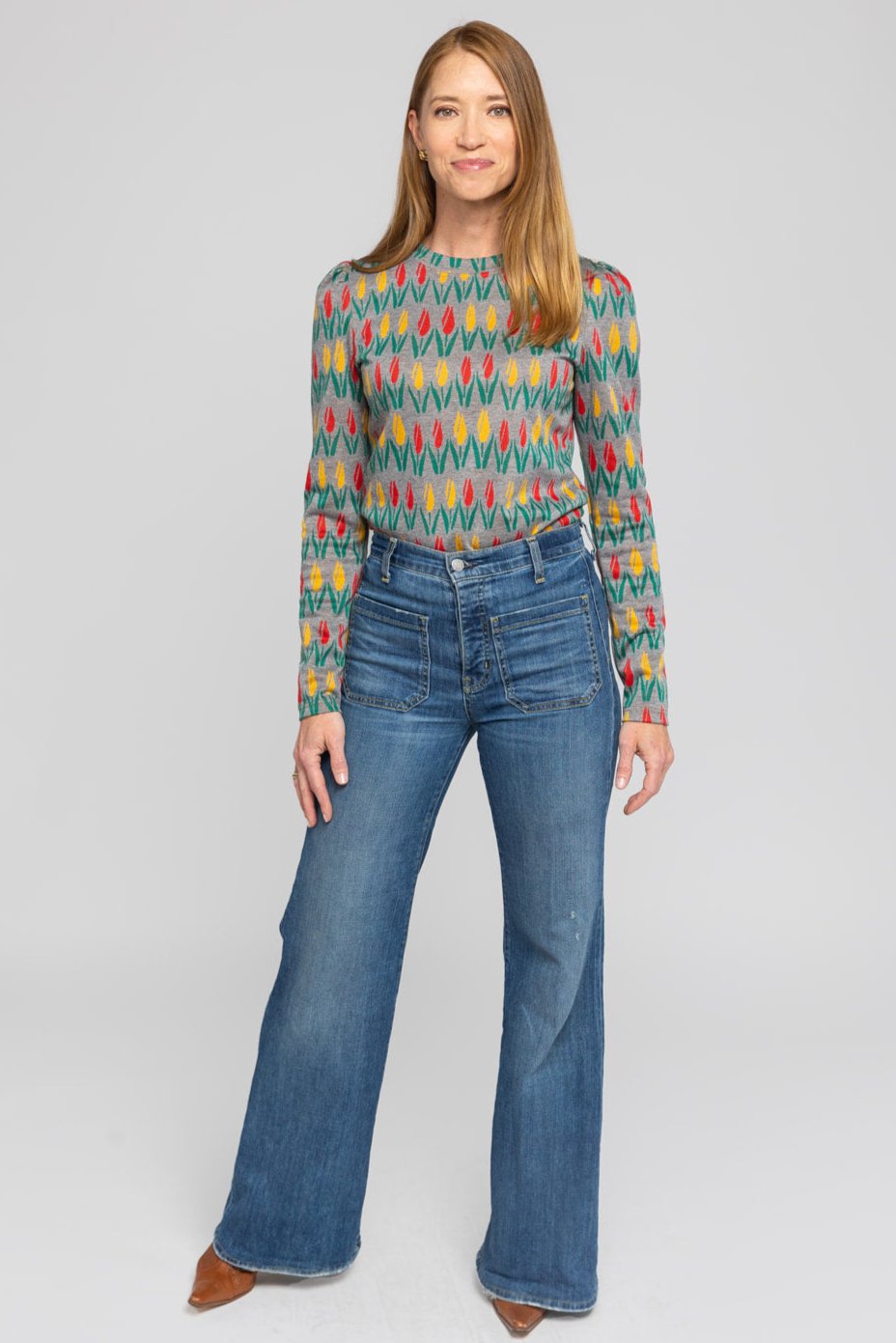 Top de punto floral con hombros abullonados, perfecto para el otoño