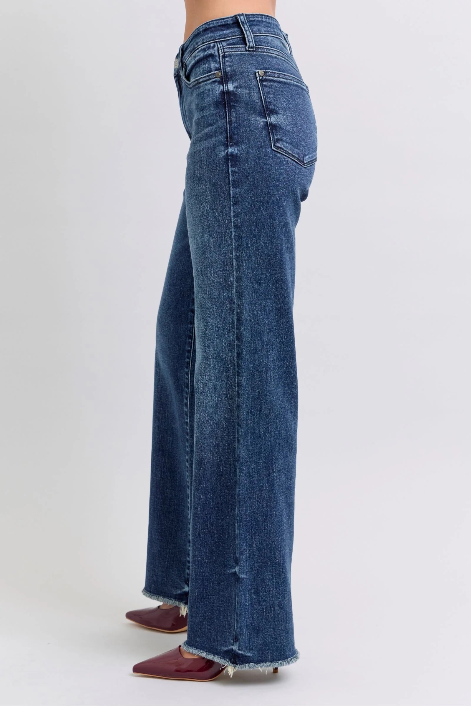 Rock your style with Judy Blue's Full Size Raw Hem Mid Rise Jeans! 🛍️✨ #FashionGoals #DenimLove